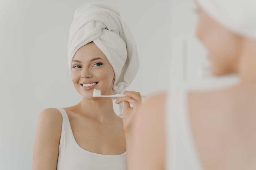 lady brushing her teeth